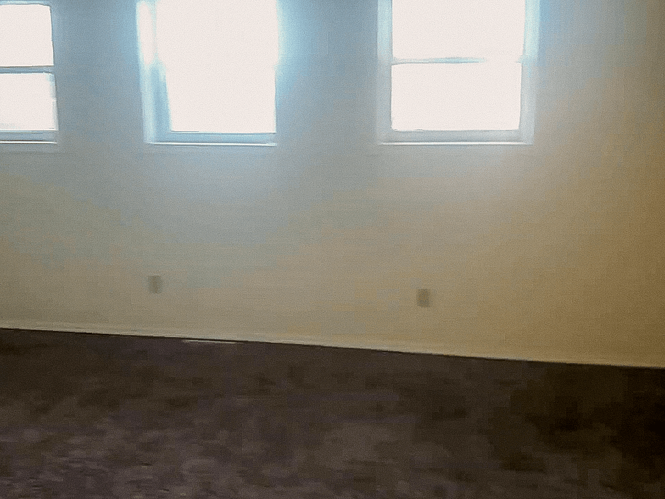 Living room in Heritage High Unit 002